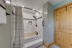 Upper-level Master bathroom tub & shower
